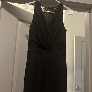 Black Express Pant Suit. All in one. Side pockets.